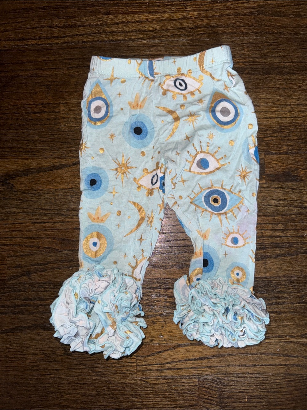 Posh Peanut Ruffled Hem Baby Leggings in Light Blue Eye Print